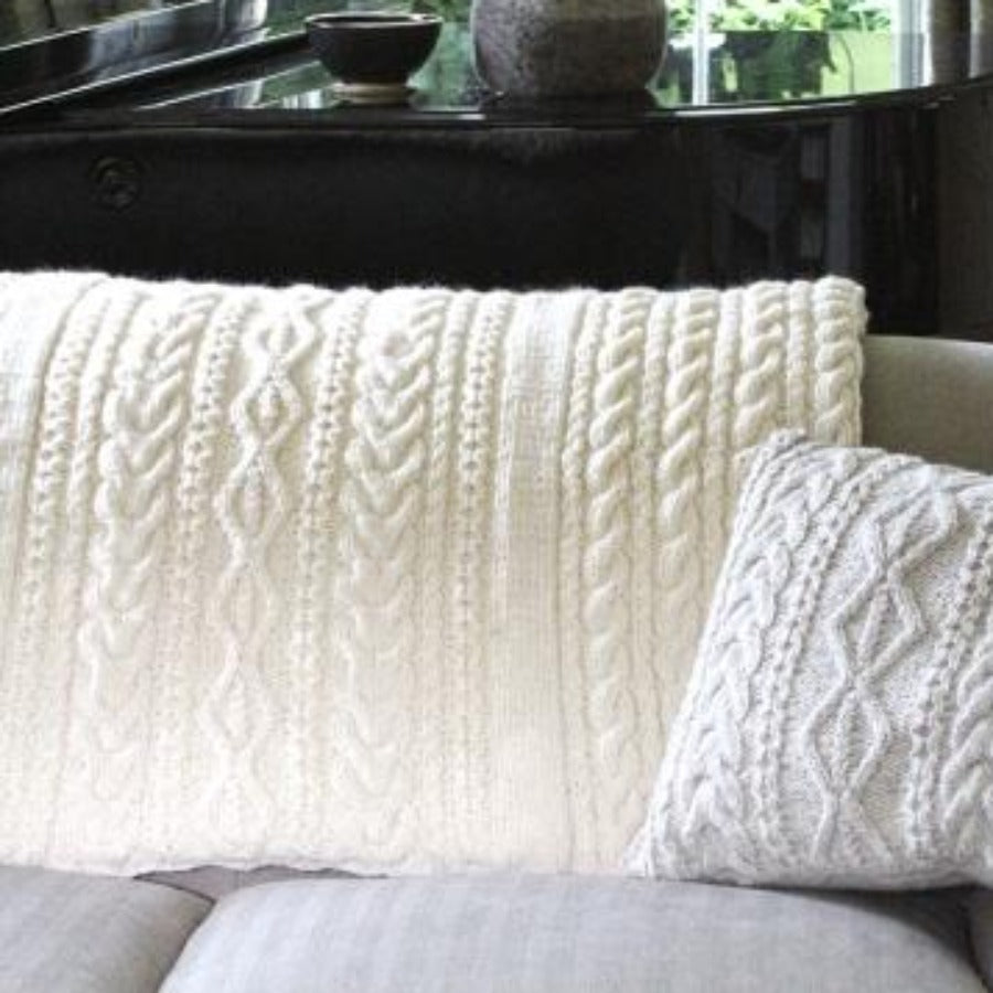Cream knitted throw and cushion