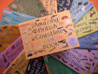 Collection of 'Amazing British Coastline' colouring books with animal illustrations.
