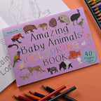 Coloring book titled 'Amazing Baby Animals' with illustrations of various animals on a purple cover, surrounded by coloring pencils.