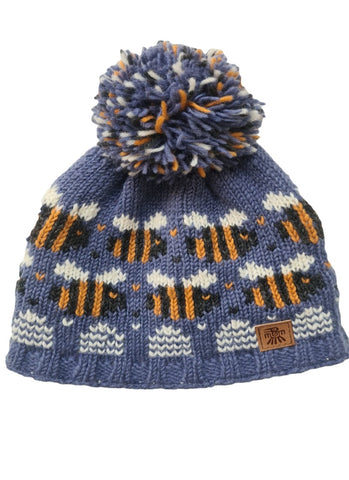 Child hat in blue with bee design all around, bobble on the top