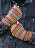 Grassington hand warmers in earthy stripe tones. 