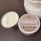 Natural Deodorant sandalwood and teatree in open tin. 