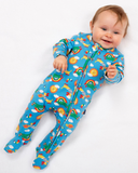 Bright blue sleep suit with rainbows sun and animals all over design.