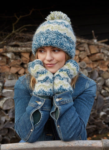 Totnes bobble beanie in a green and blue mix, with a bobble on the top