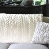 Cream knitted throw and cushion 