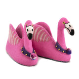 A pair of pink flamingo shaped slippers