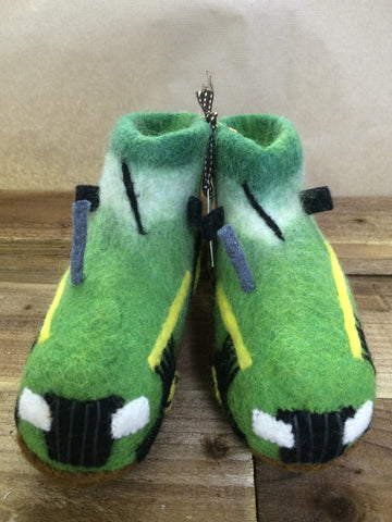 Mainly green felted tractor shaped slippers