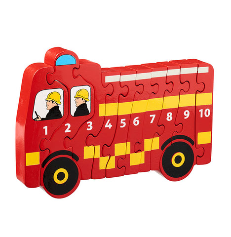 A fire engine shaped jigsaw in a bright red colour.