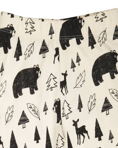 Cream leggings with black bear and woods printed all over 