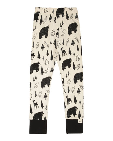 Cream leggings with black bear and woods printed all over 