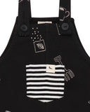 Black dungarees with a white sew and grow all over print